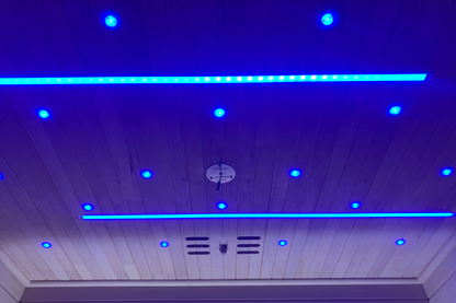 Blue LED accent lighting illuminating the ceiling inside the Blisspod Bergen Deluxe sauna