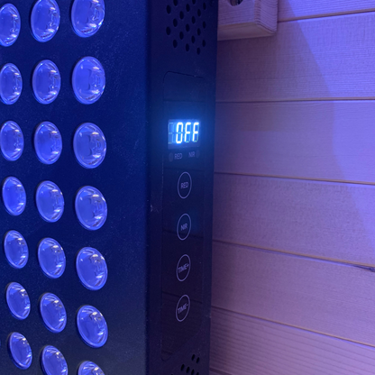 Close-up of blue interior lighting and illuminated panel inside Blisspod Helsinki Deluxe sauna
