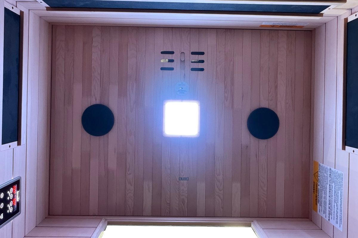 Interior of Blisspod Malmo infrared sauna with Canadian hemlock wood and seating