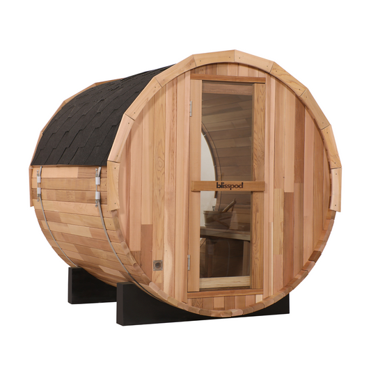 Blisspod Prague outdoor red cedar barrel sauna with glass door and dark shingle roof, shown at an angle