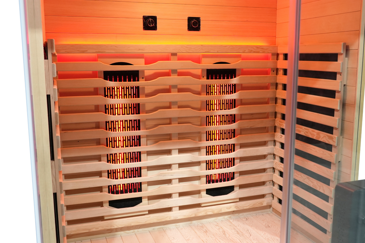 Full spectrum infrared heaters and Canadian hemlock interior of Blisspod Vantaa RED sauna
