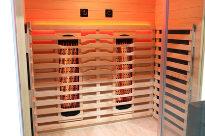 Full spectrum infrared heaters and Canadian hemlock interior of Blisspod Vantaa RED sauna

