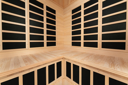 Corner bench seating and wall-mounted infrared heater panels inside the Blisspod Vienna sauna