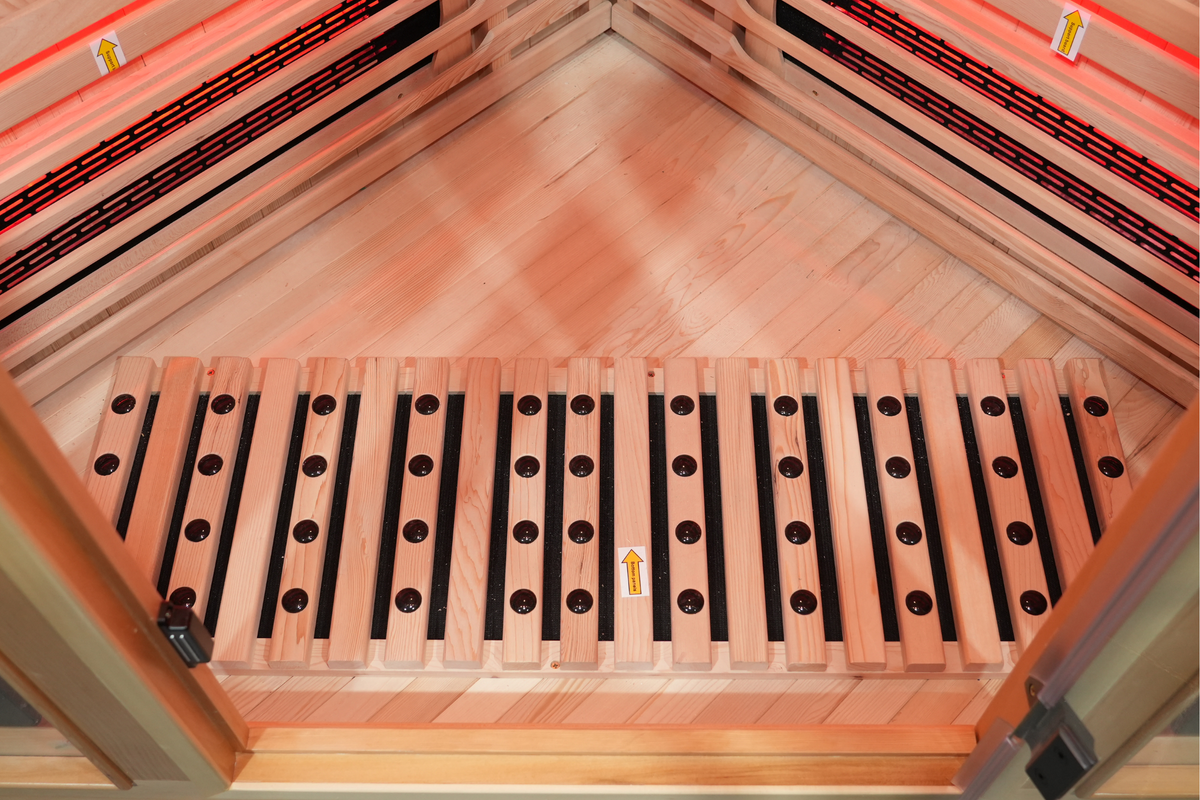 Wooden floor heating area inside the Blisspod Vienna RED full spectrum infrared sauna
