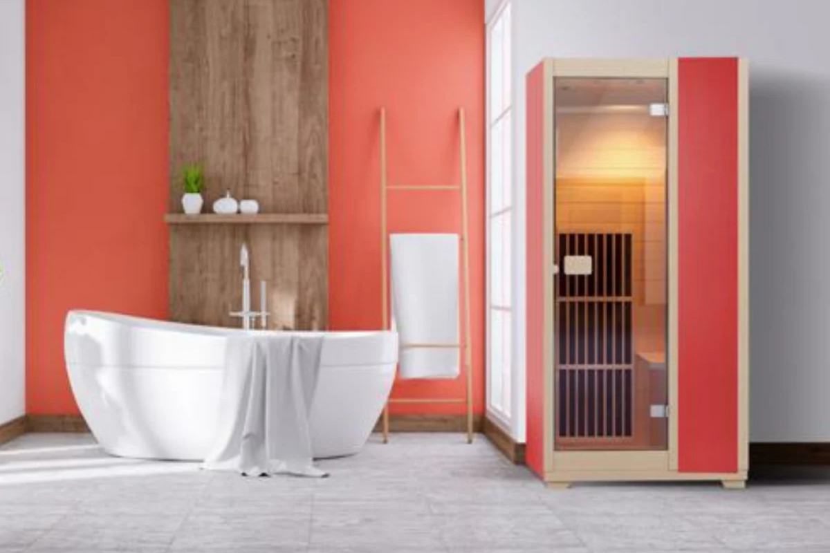 Red Blisspod Vienna infrared sauna displayed in a contemporary indoor living space
