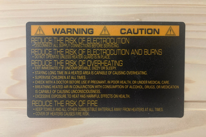 Manufacturer safety warning label inside Blisspod Vienna 1-person infrared sauna covering electrical, overheating and fire precautions
