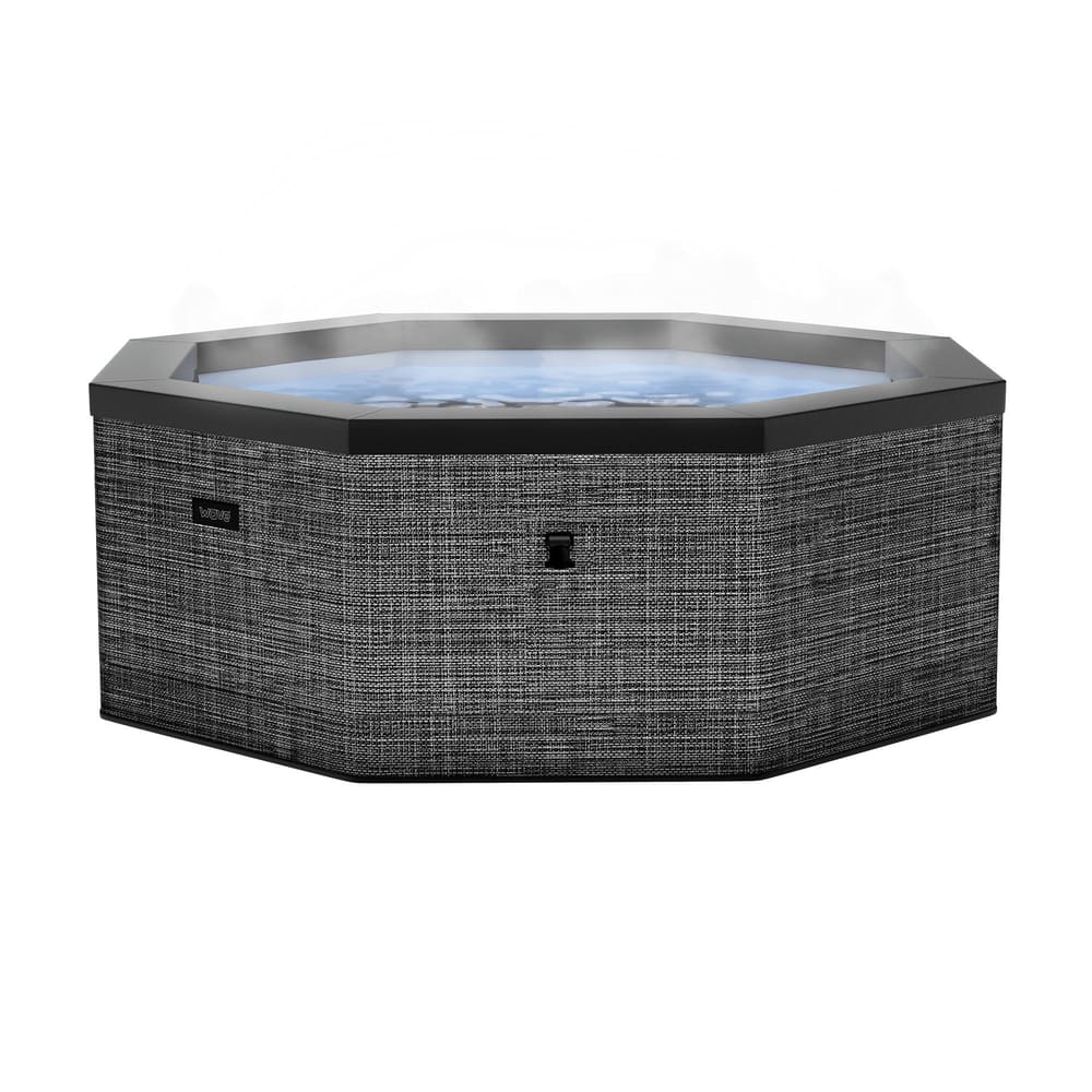 Como 6-person octagonal foam hot tub in Flint with gray patterned exterior and bubbling water visible