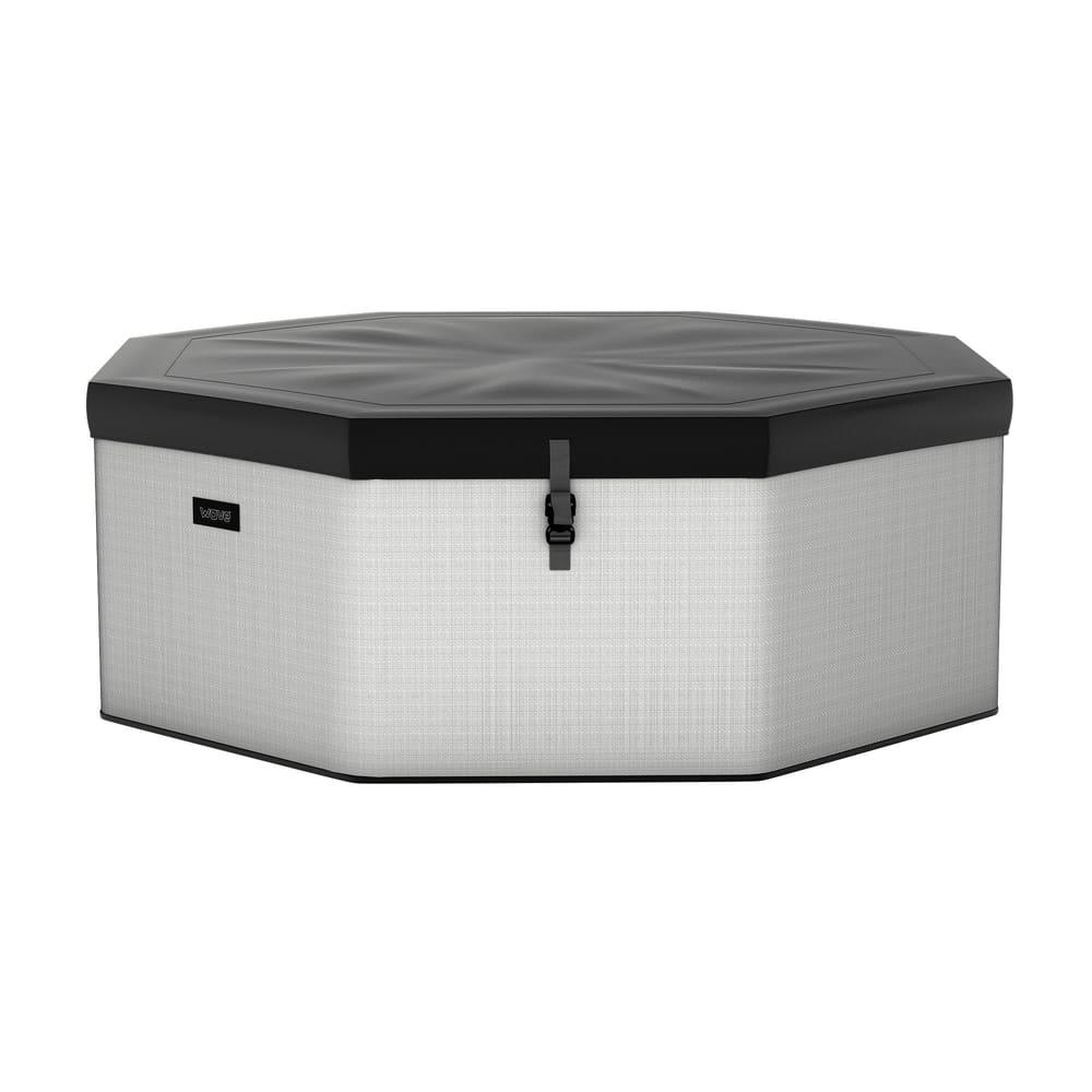 Como 6-person octagonal foam hot tub with light gray exterior and dark cover secured over the top