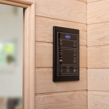 Close-up of exterior control panel mounted on the wooden wall of the Durasage infrared sauna
