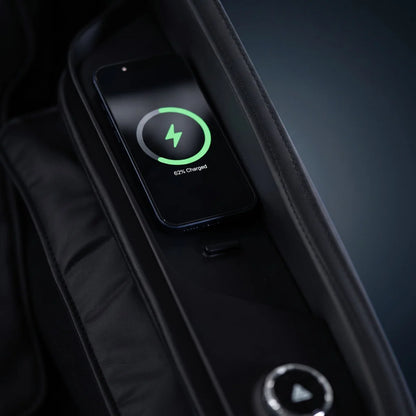 Close-up of wireless phone charging feature on Floridian Rebel 4D massage chair armrest