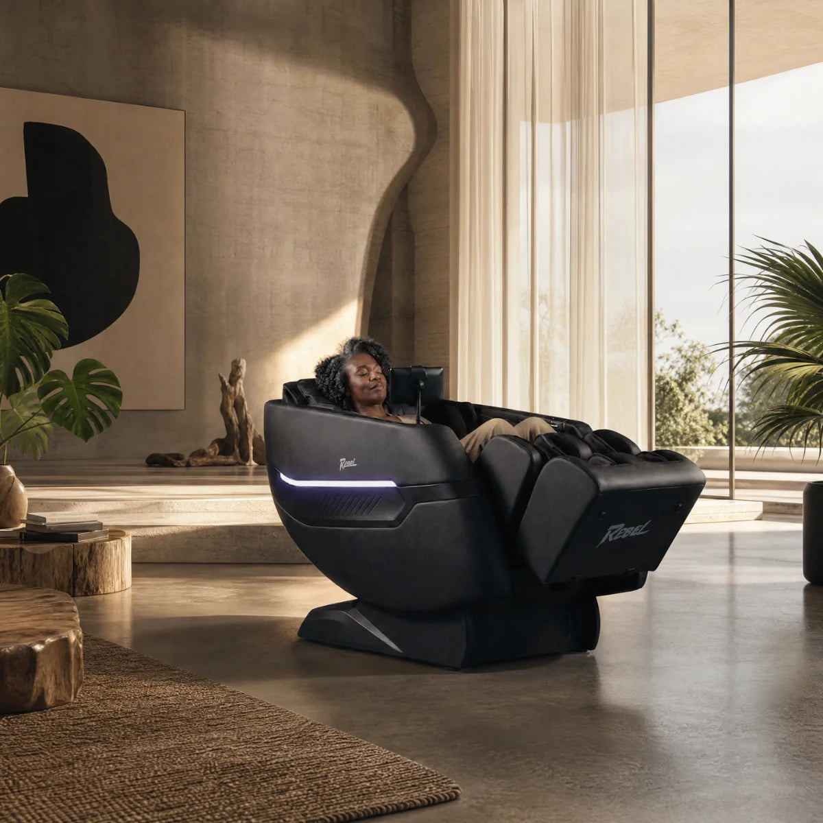 Woman reclining in Floridian Rebel 4D zero gravity massage chair in a modern living room