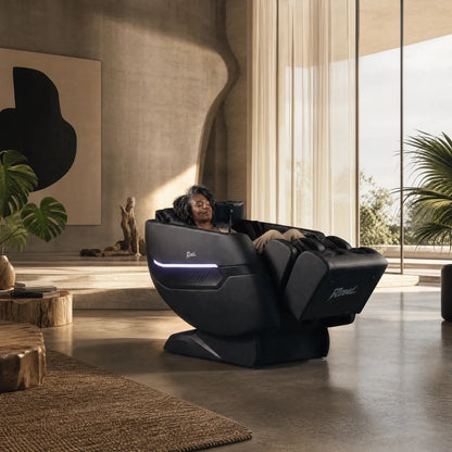 Woman reclining in Floridian Rebel 4D zero gravity massage chair in a modern living room