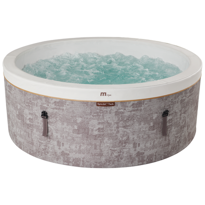 MSpa COCOON 6-person hot tub filled with water, showing round rigid foam construction
